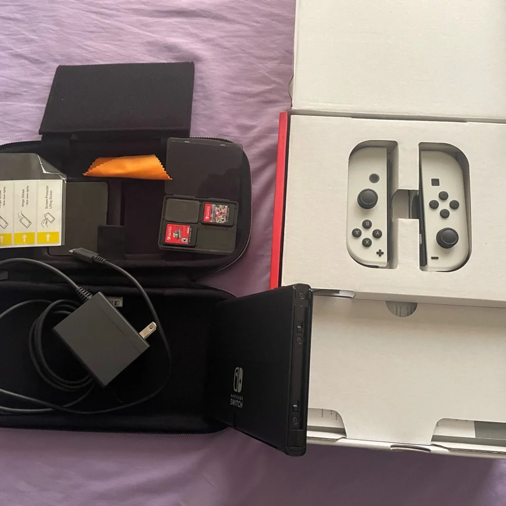 Nintendo Switch with Gray Joy-Con and Accessories